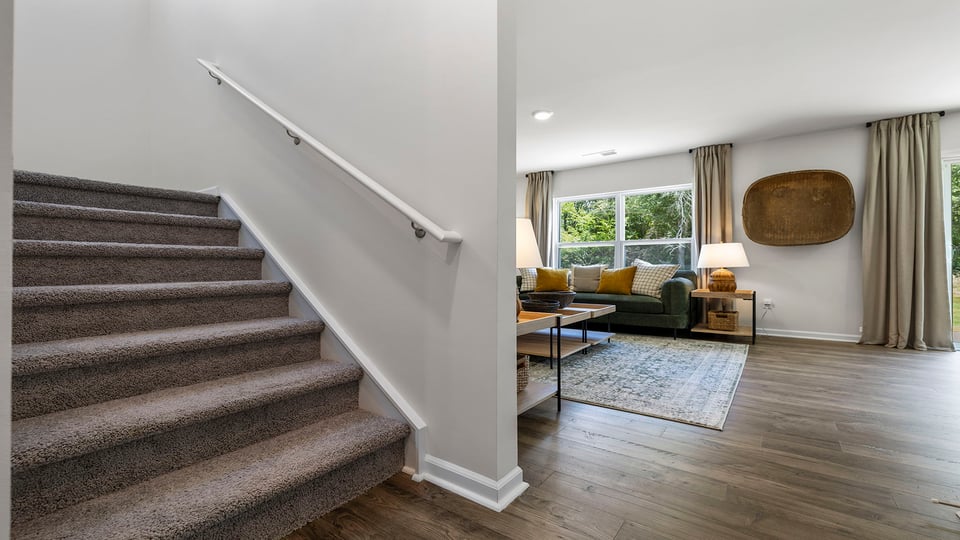 View of family room and stairs.