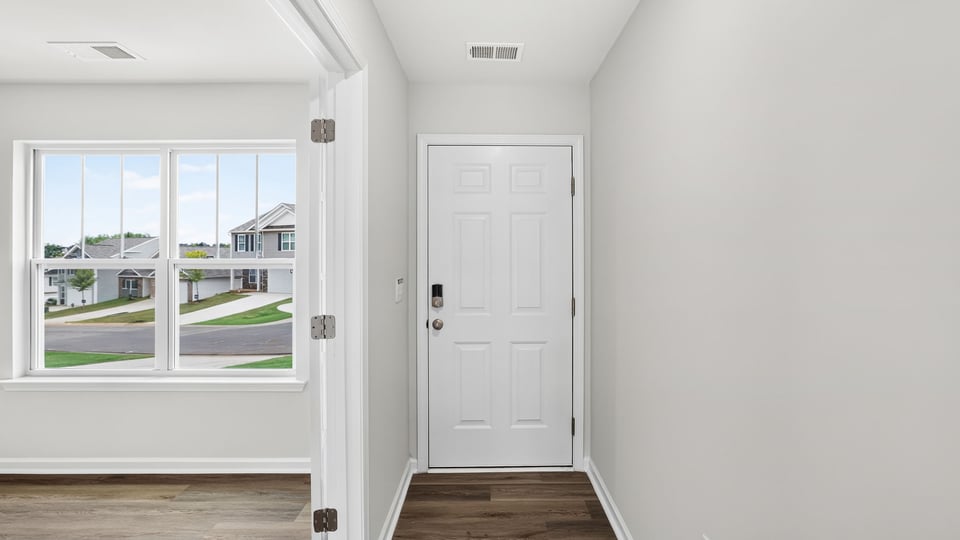 View of front door and office window