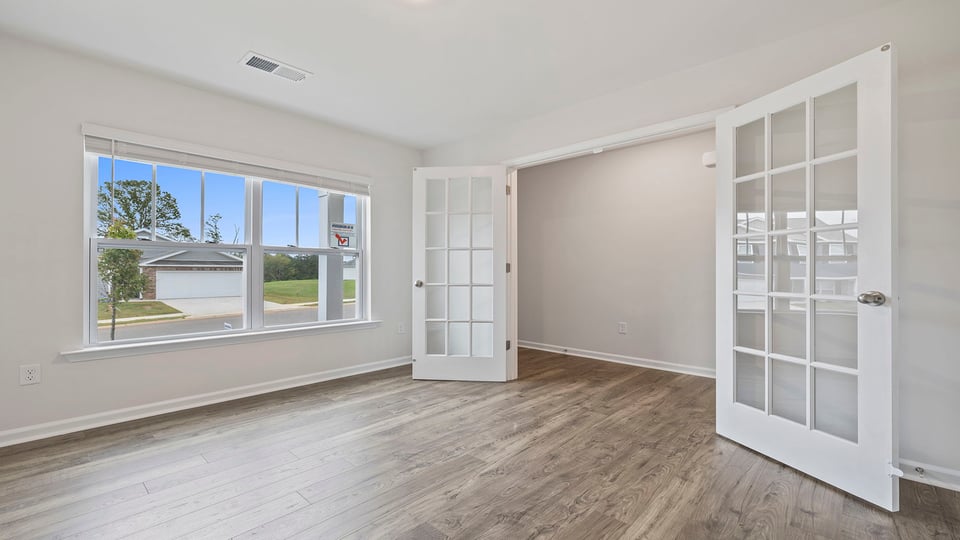 Study with windows and French door.