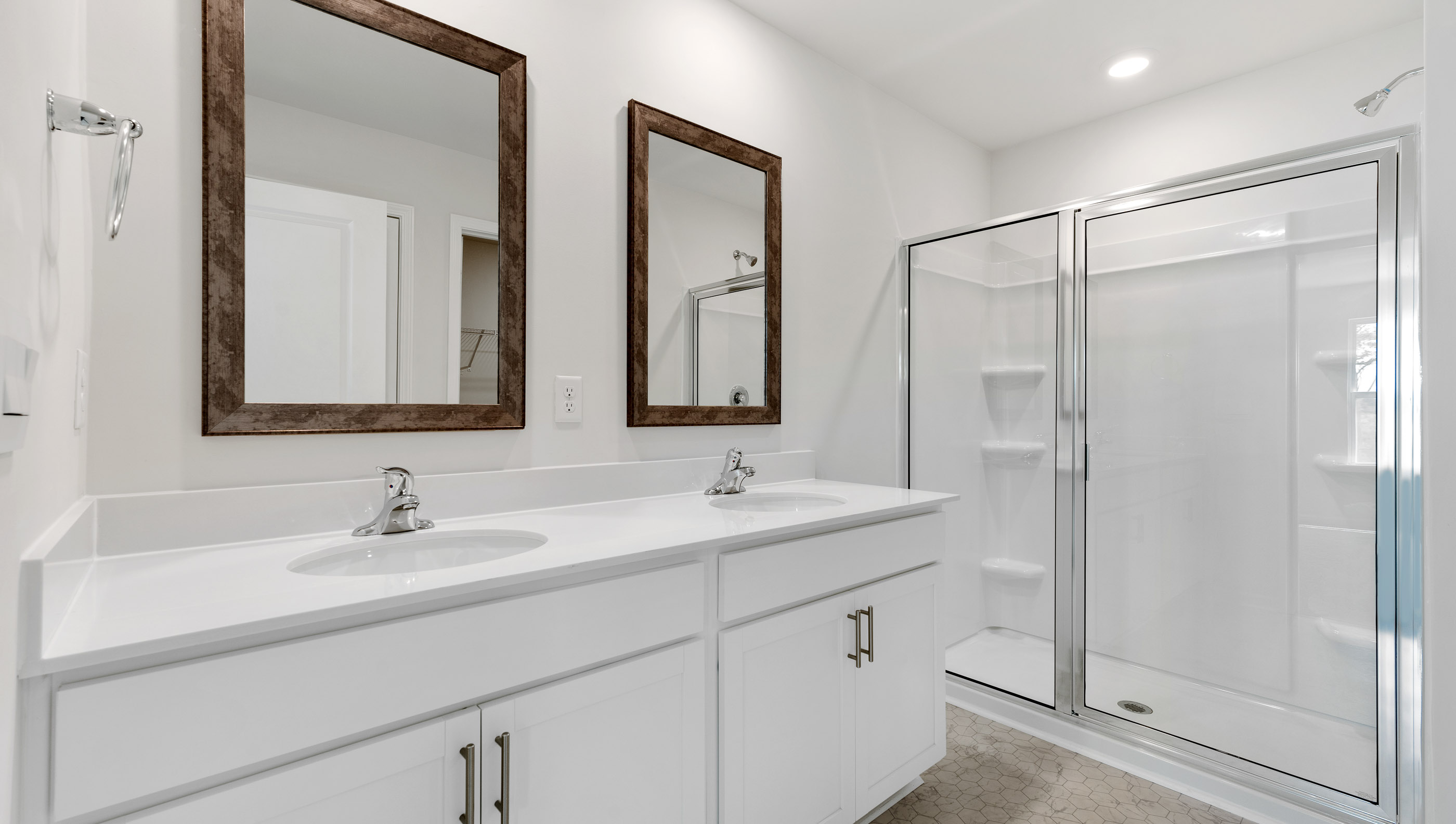 Primary bathroom with double vanity sink.