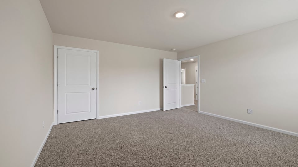 Bedroom with carpet.