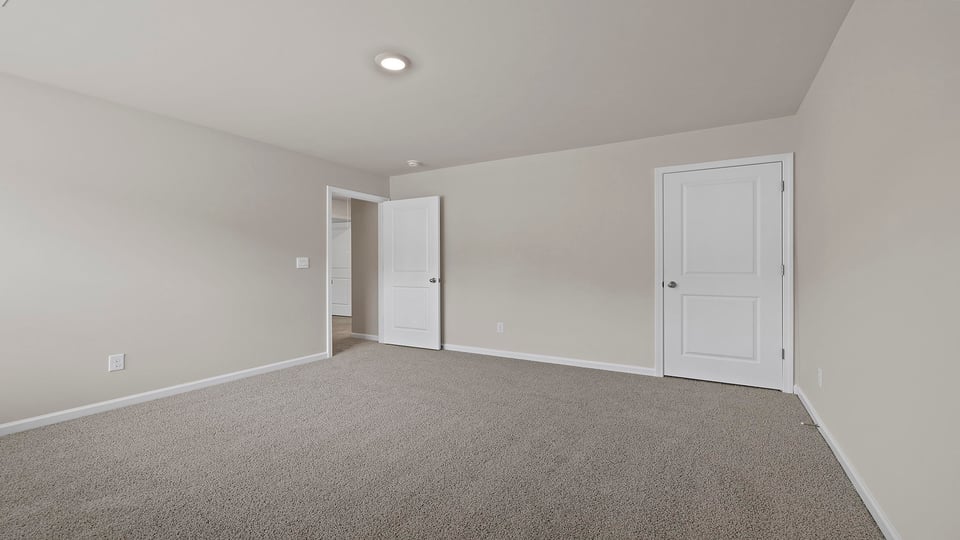 Bedroom with carpet.