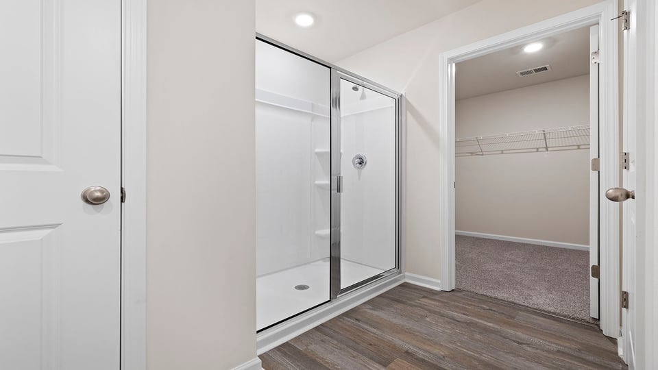 Bathroom with walk in shower.