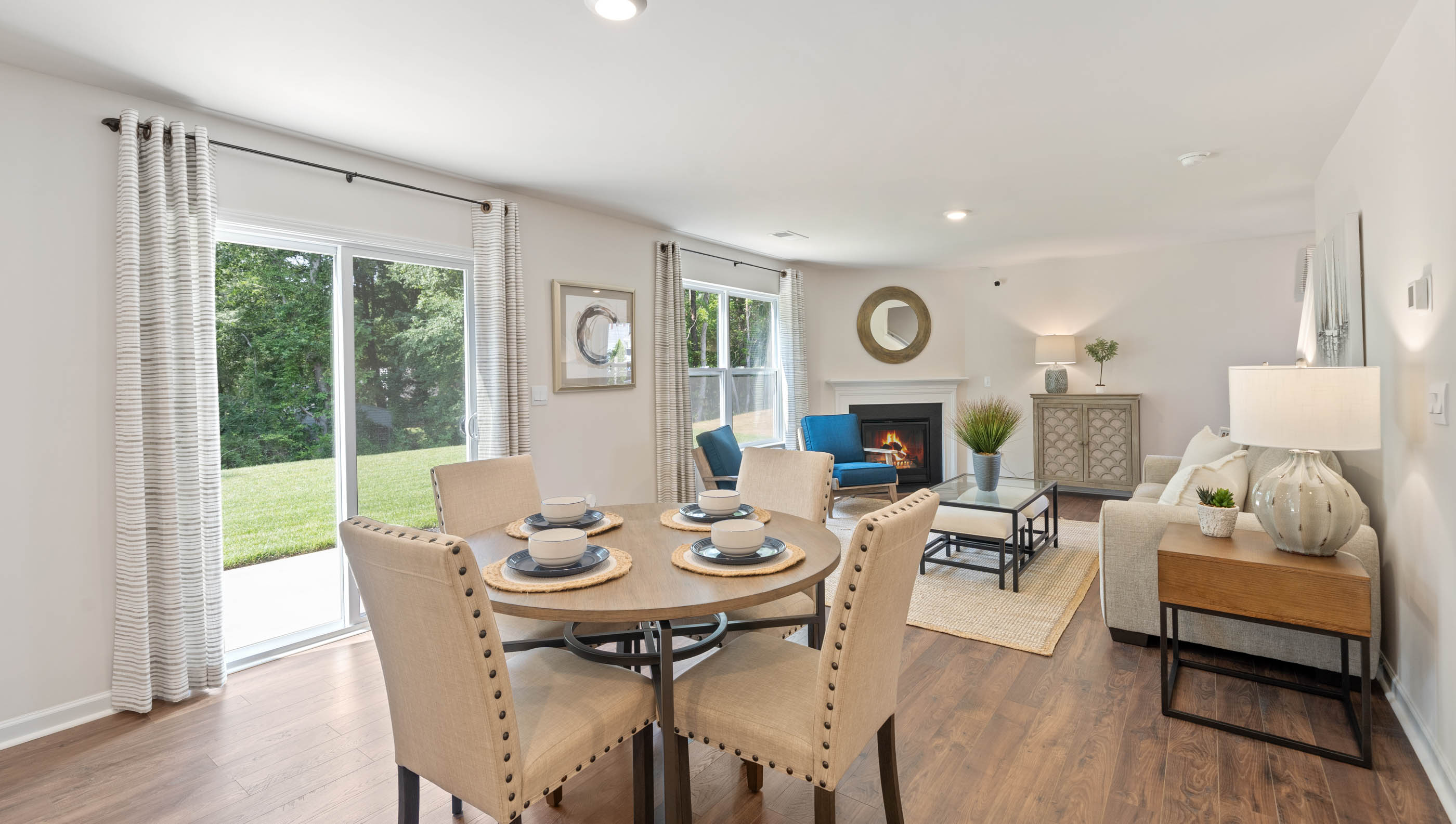 Dining area in the kitchen with view of family room.