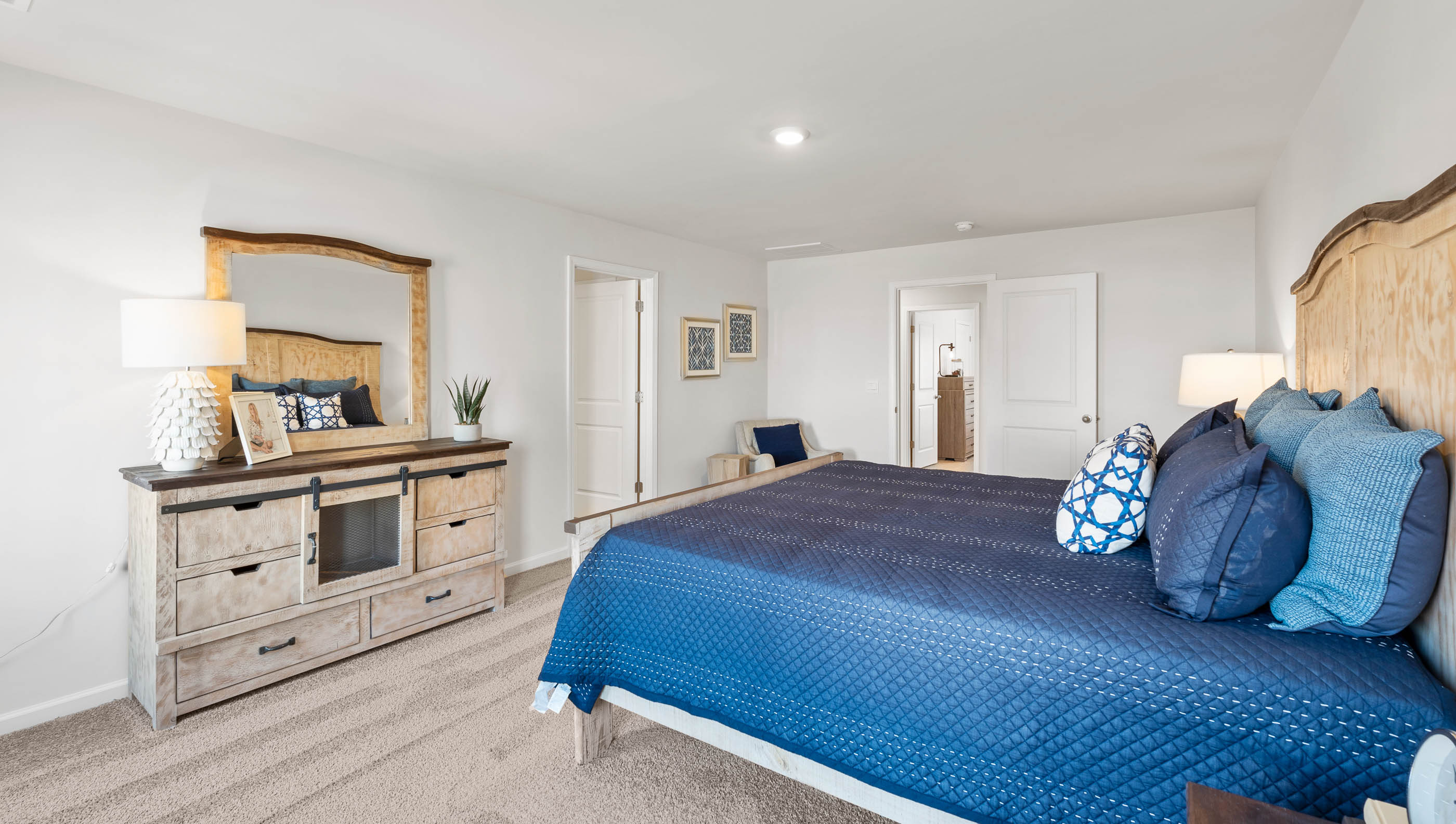 Bedroom with carpet and window.