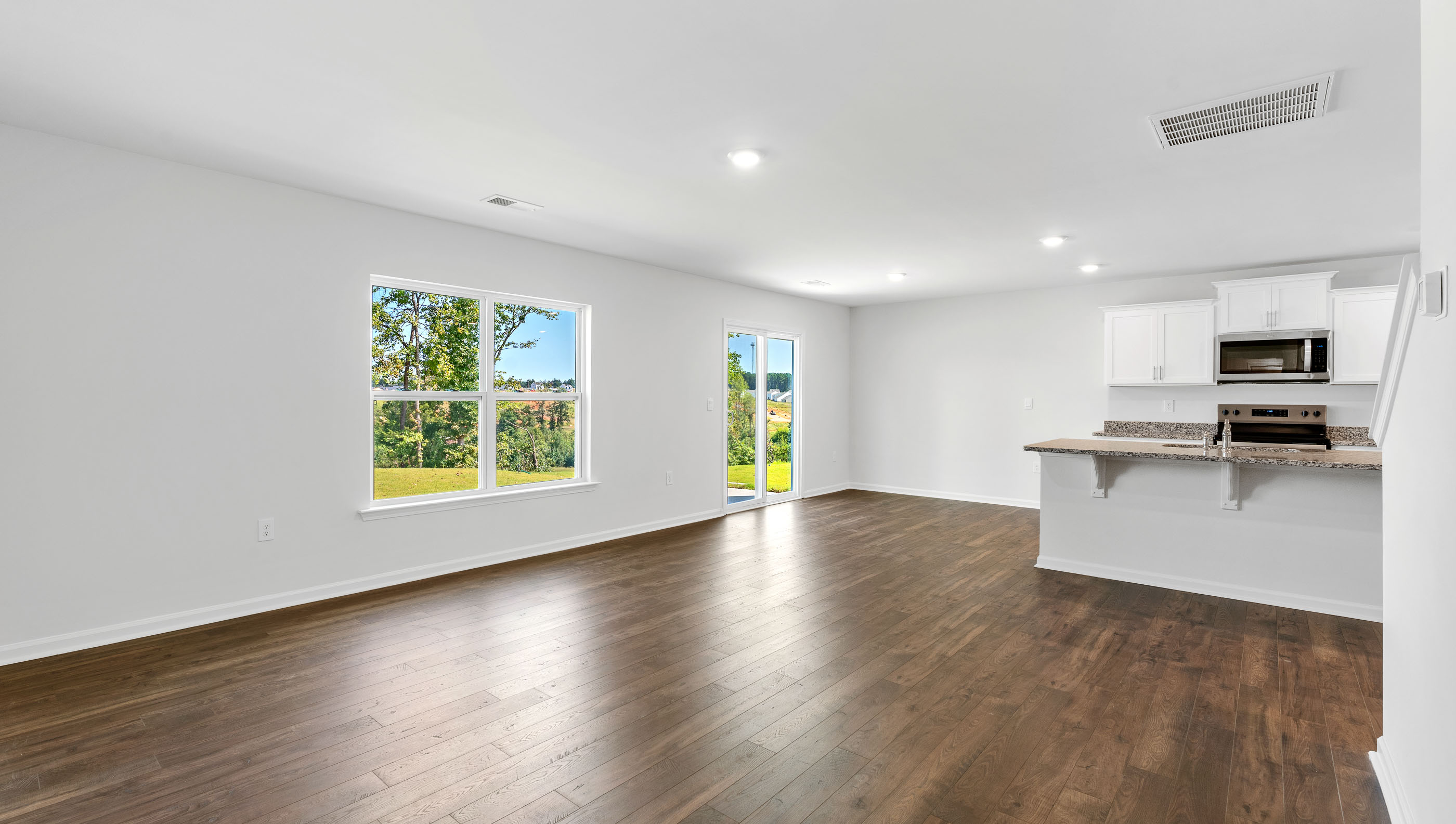 Living room facing kitchen.
