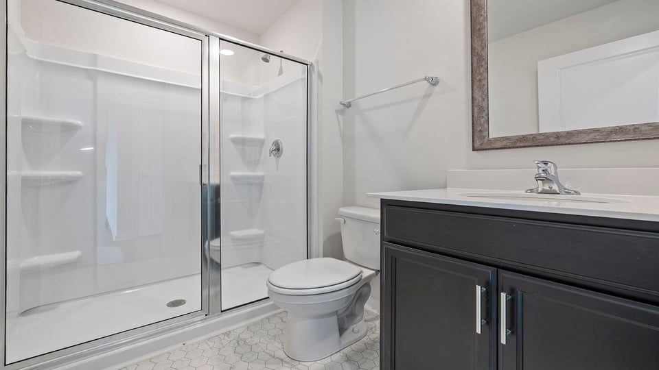 Bathroom with vanity and tub.