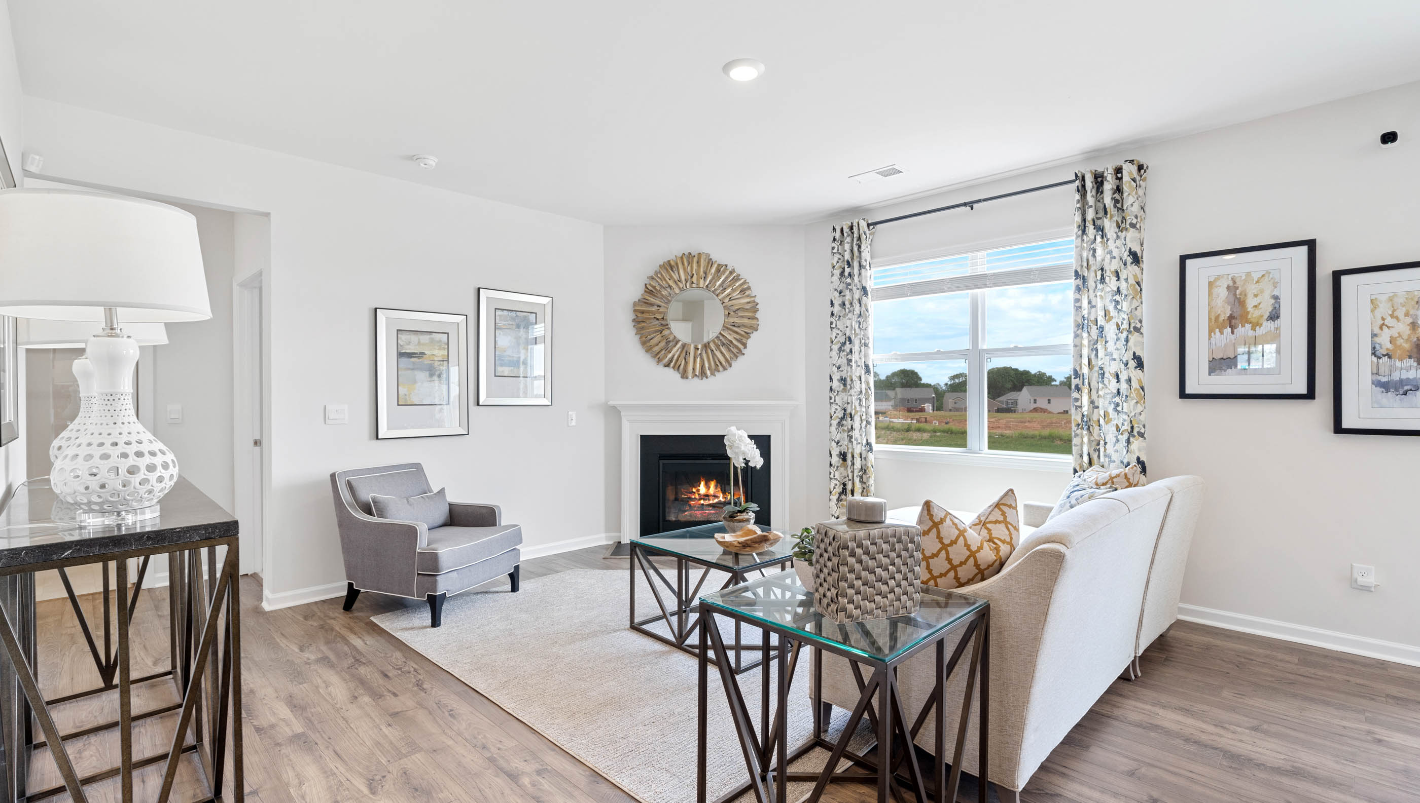 Family room with windows and fireplace.
