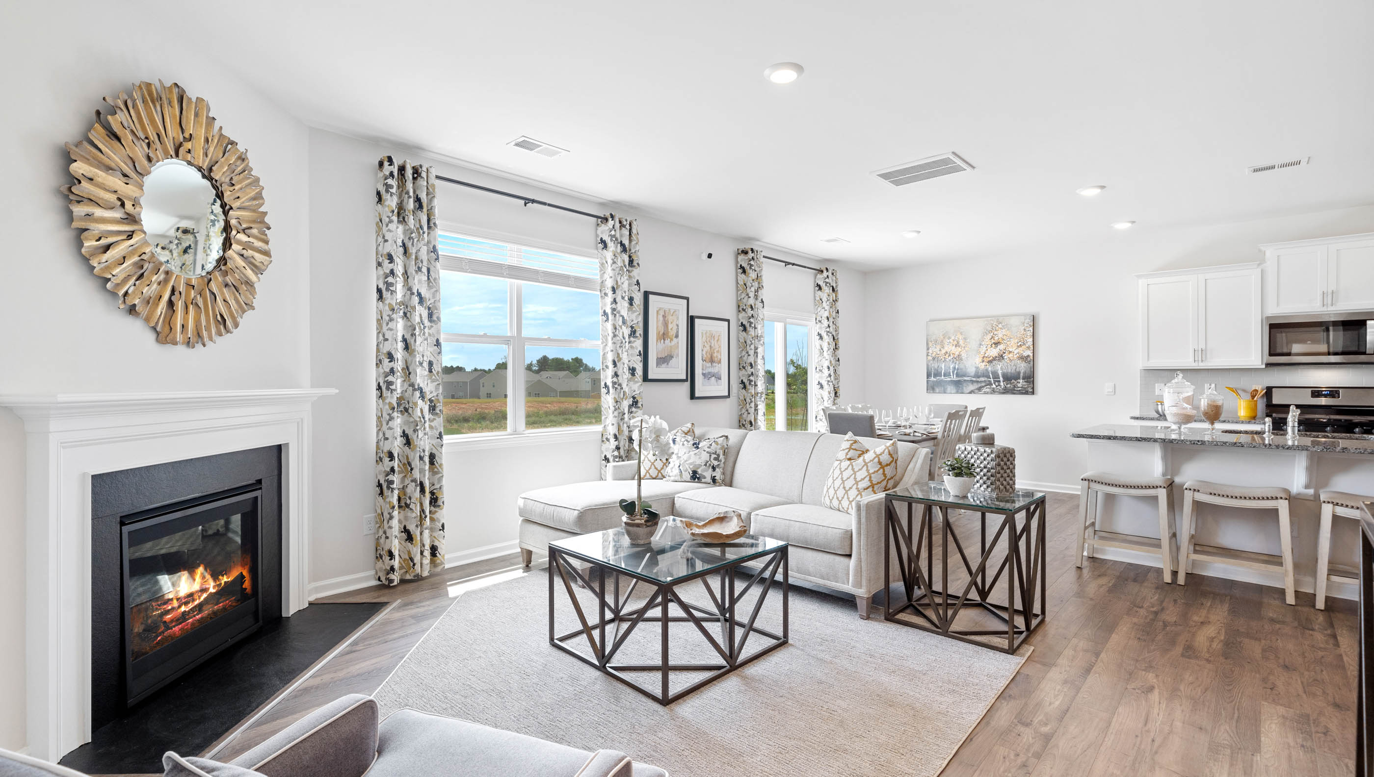 Family room with windows and fireplace.