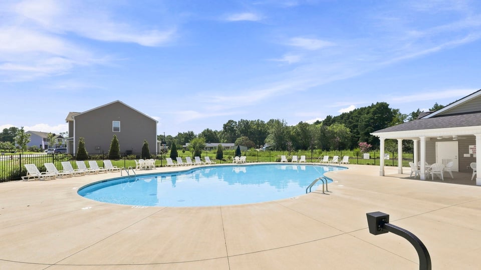Pool with chairs for relaxing.