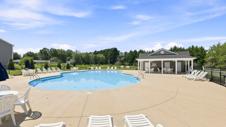Pool with chairs for relaxing.