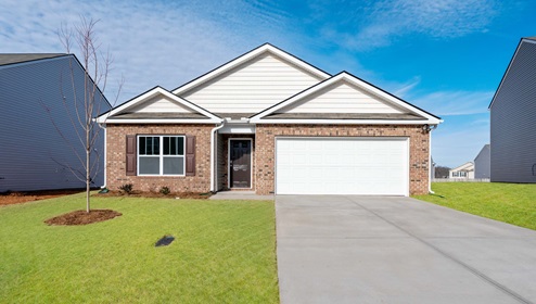 Front exterior of Cali with 2 car garage.