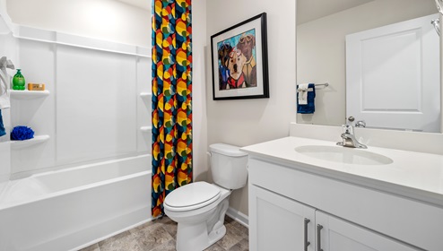 Bathroom with toilet and sink.