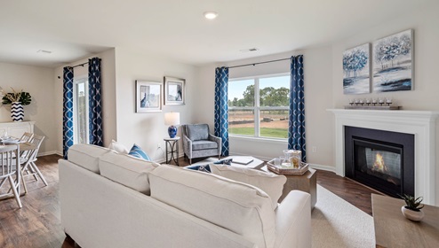Family room with windows and fireplaces.