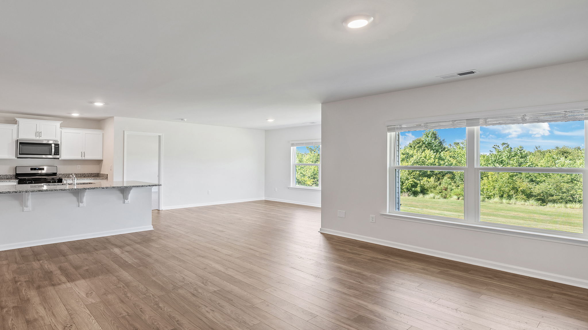Family room with windows.
