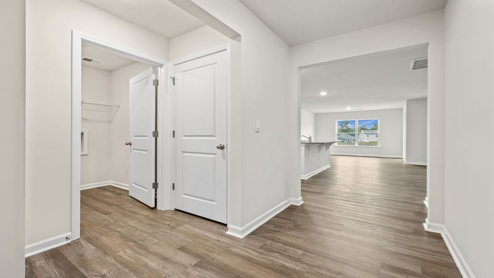 Hallway with view of rooms.