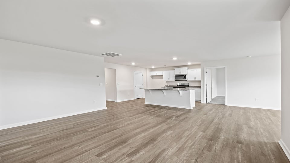 Family room with windows.