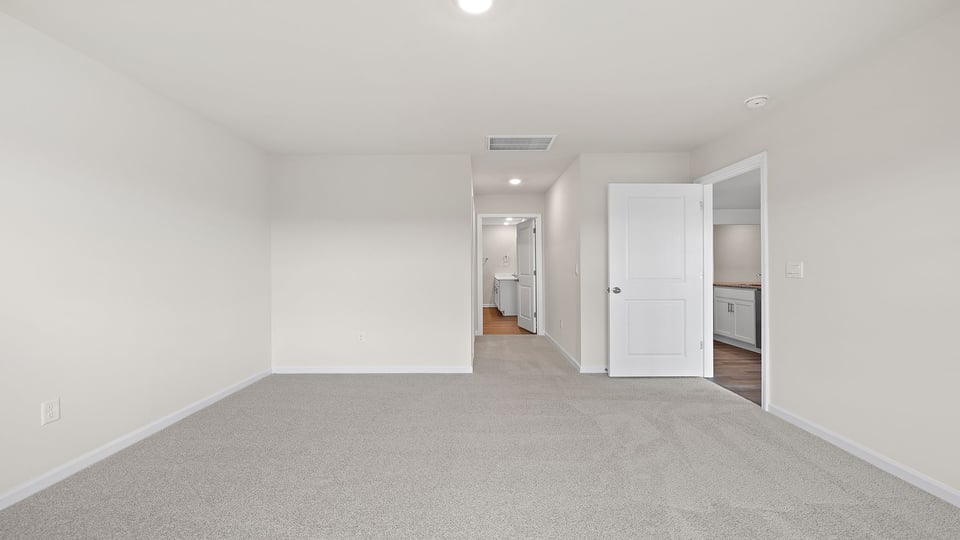 Bedroom with carpet.