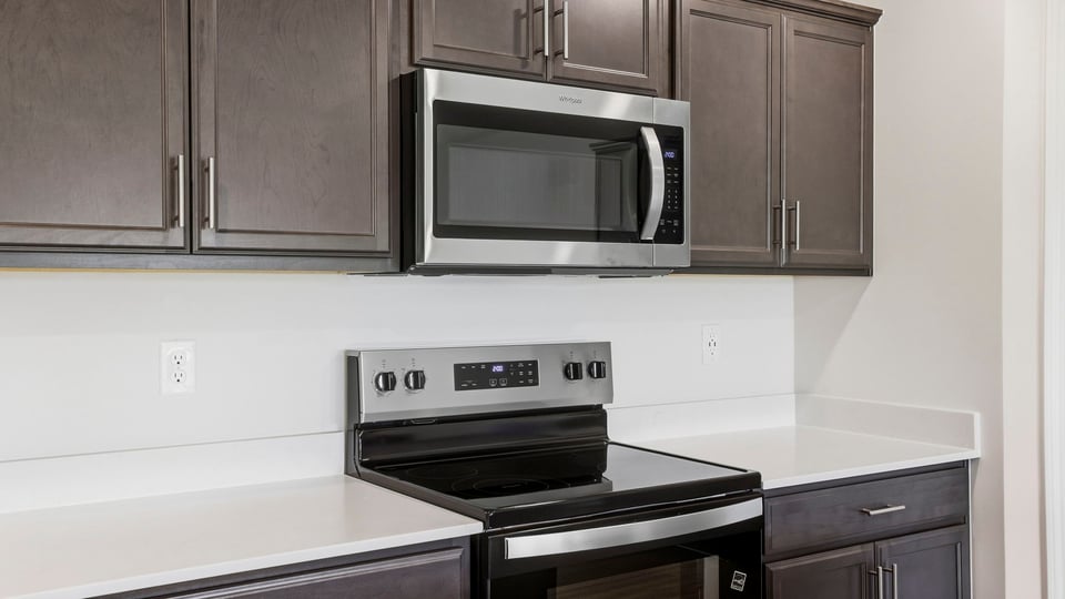 Kitchen with island and countertops.