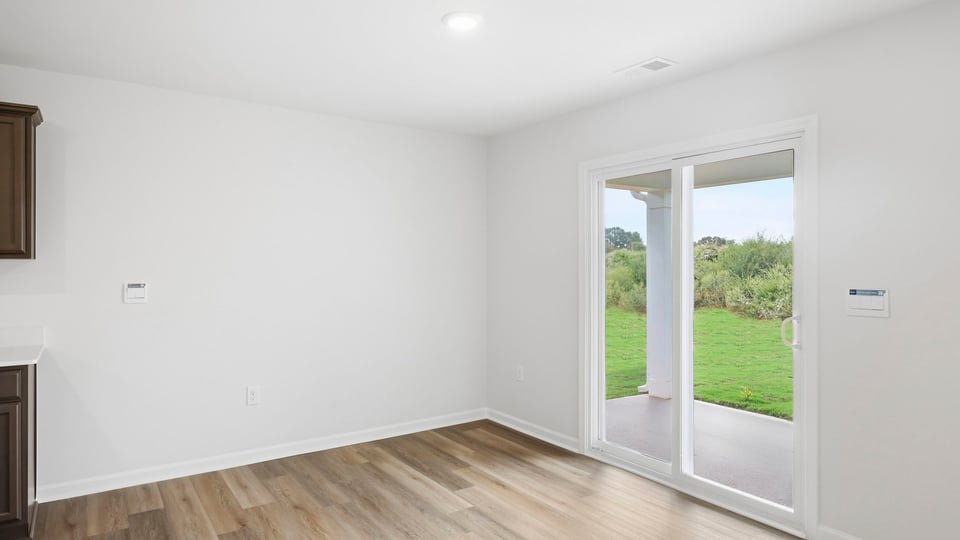 Dining room with sliding door.