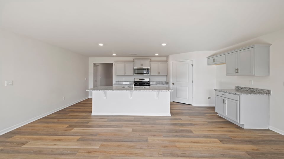 Family room looking at kitchen.