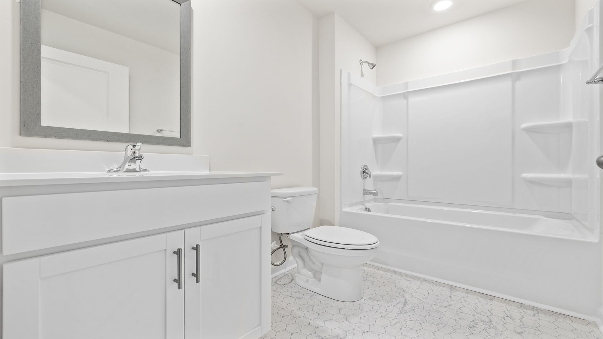 Bathroom with single vanity sink and tub.