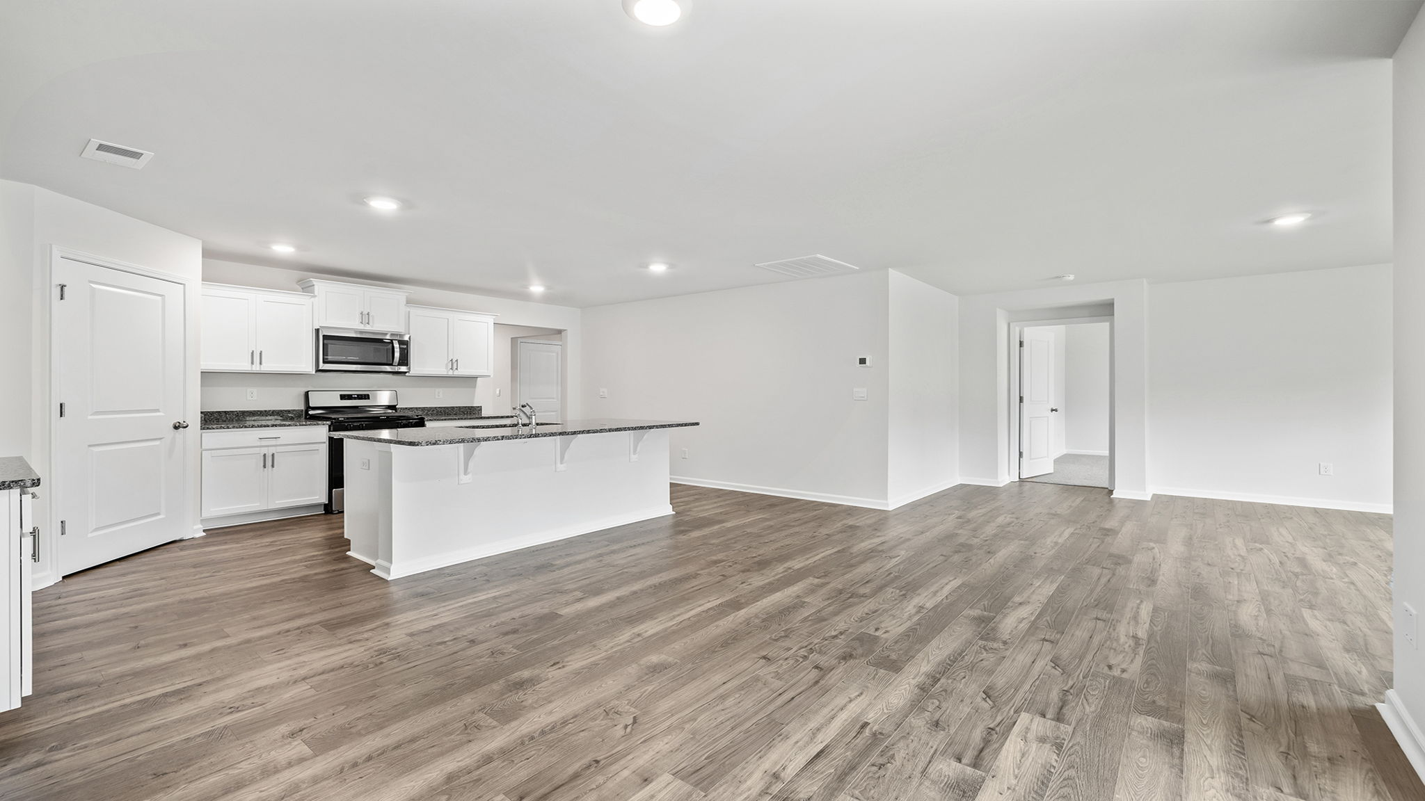 Family room with windows.
