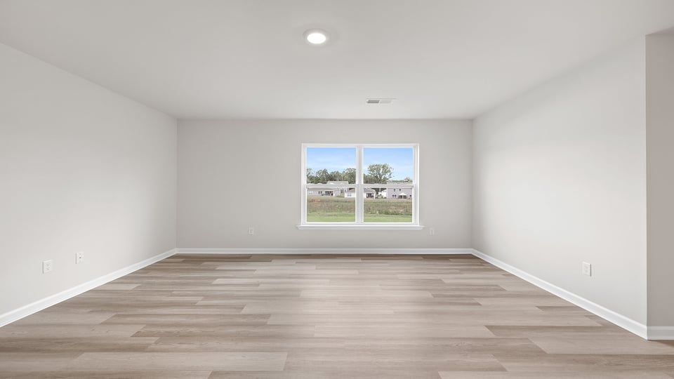 Family room with windows.