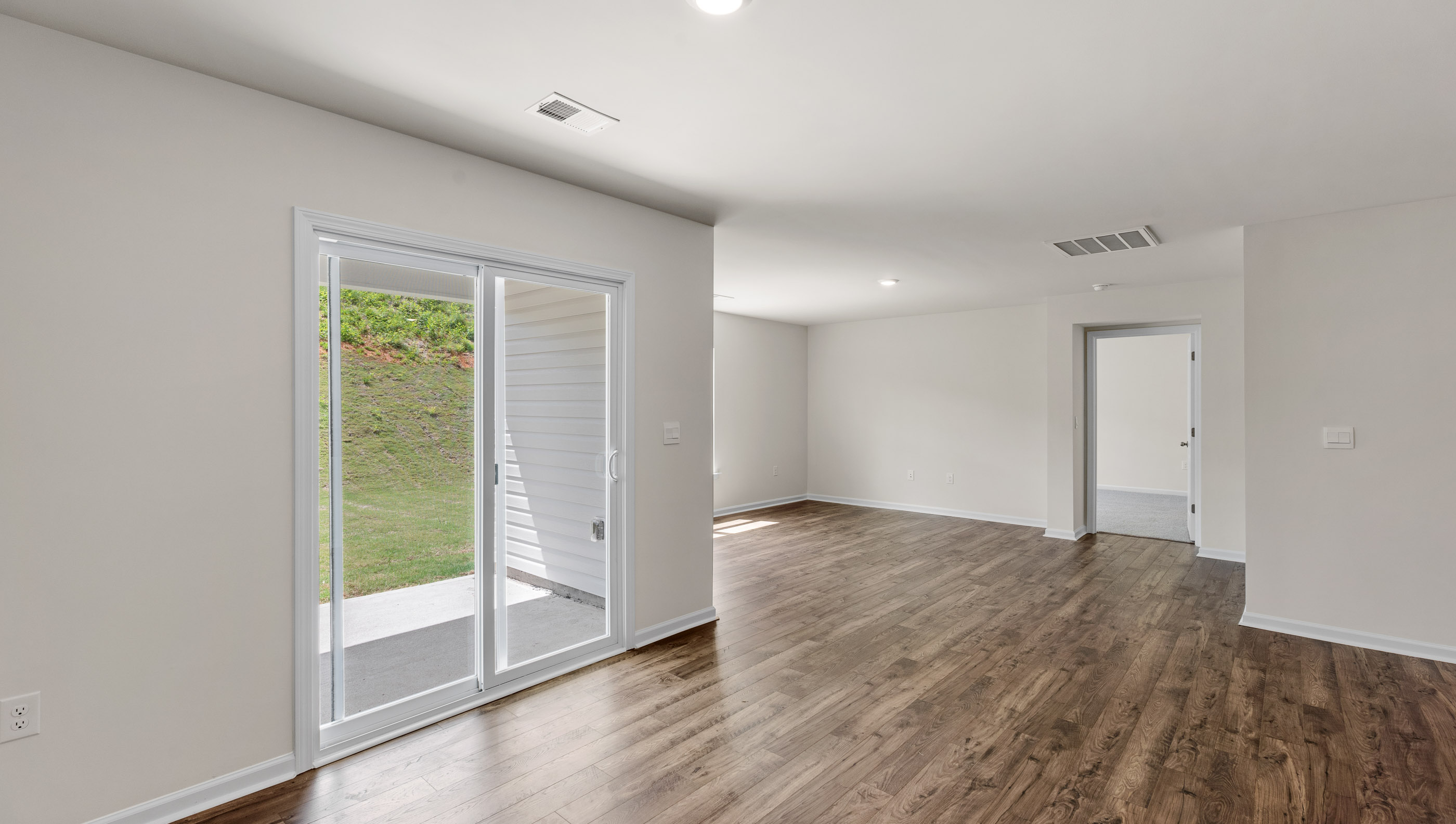 Dining room area with sliding door.