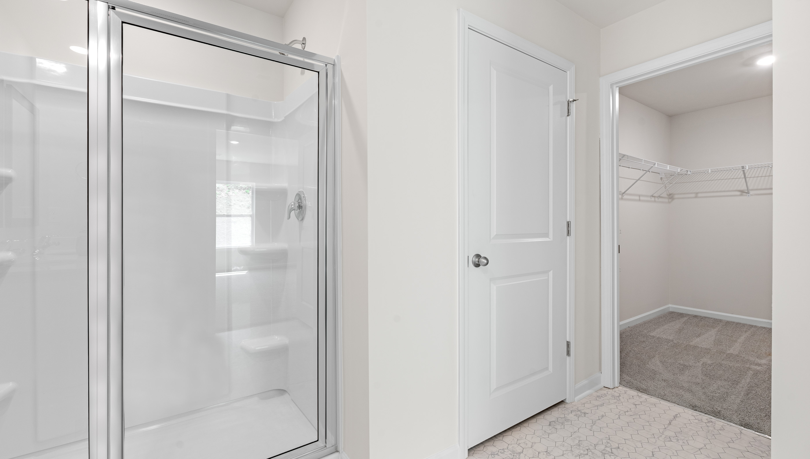 Bathroom with walk in shower.