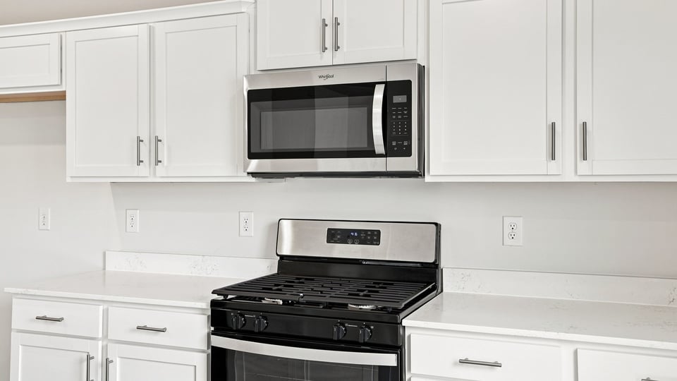 Kitchen with island and countertops.