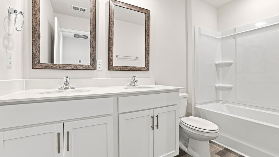 Bathroom with vanity and tub.