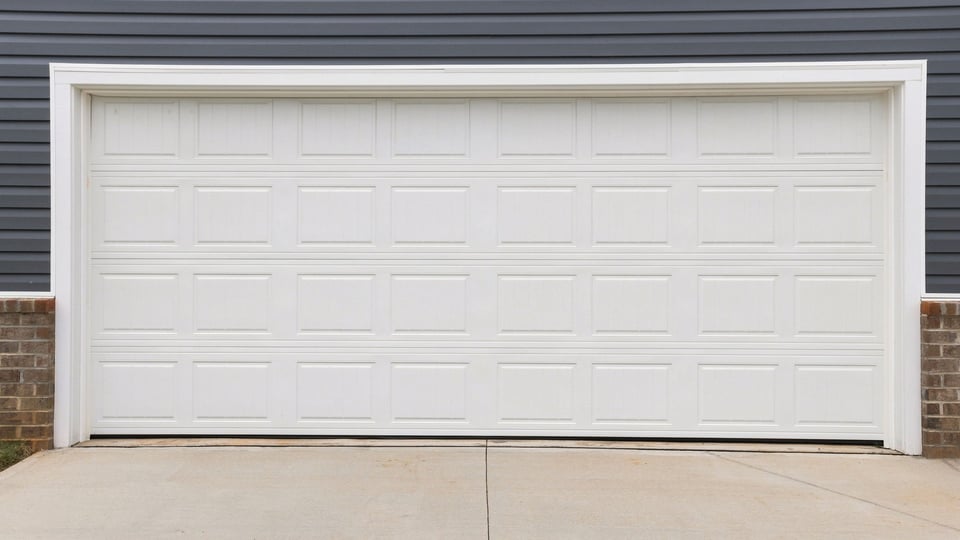 Exterior of home with large backyard.