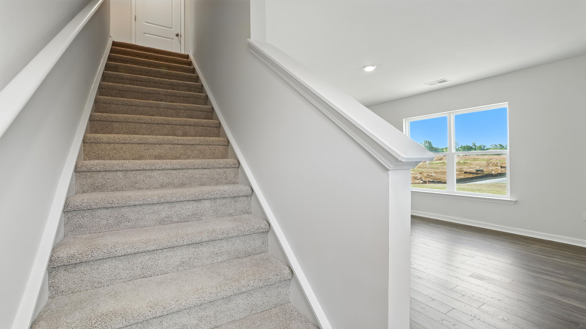 Stairs leading to second level.