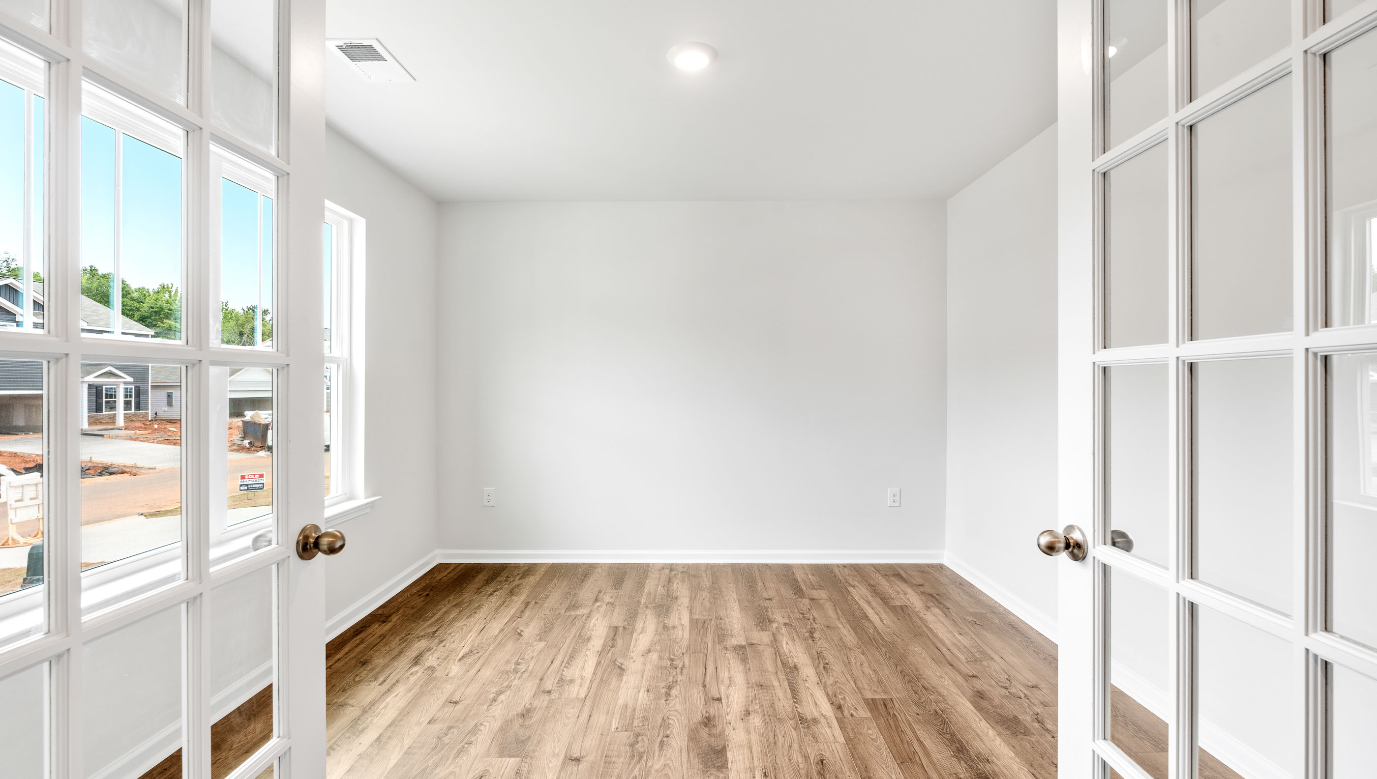 Study with windows and French doors.