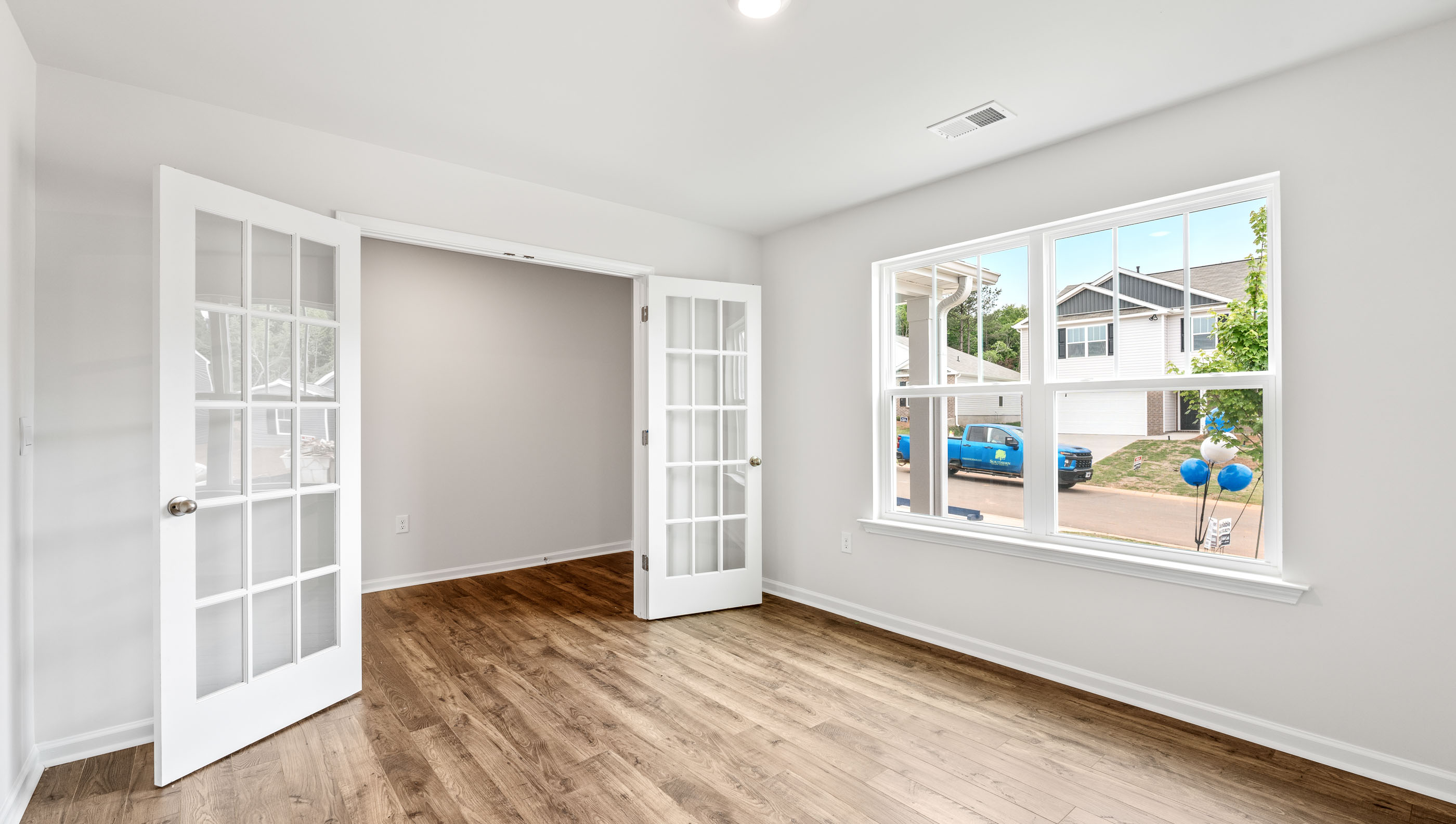 Study with windows and French doors.