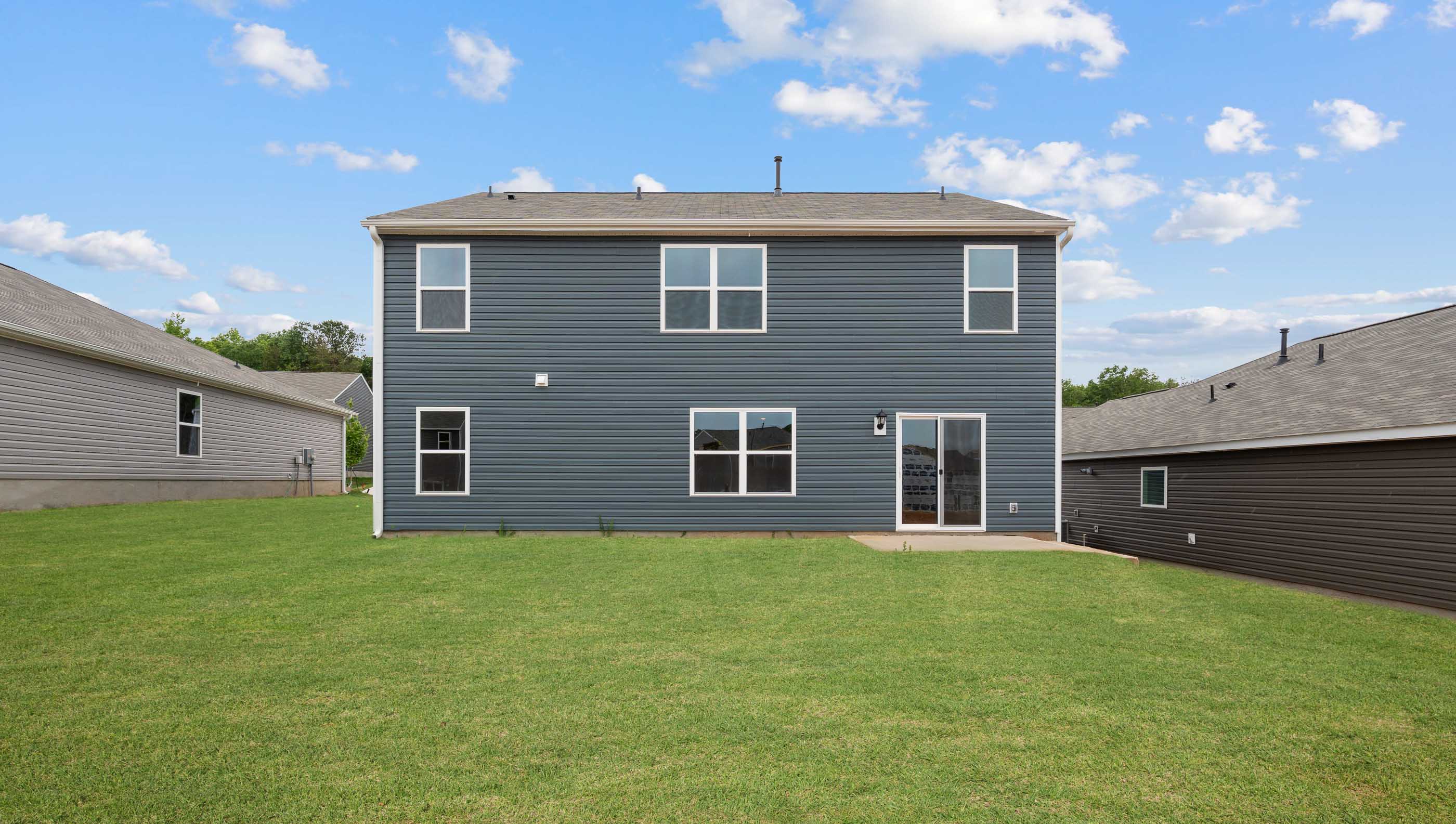 Large backyard of home.