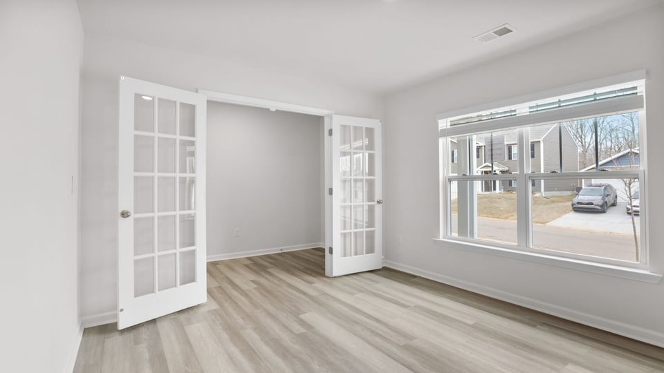 View of flex room with French doors