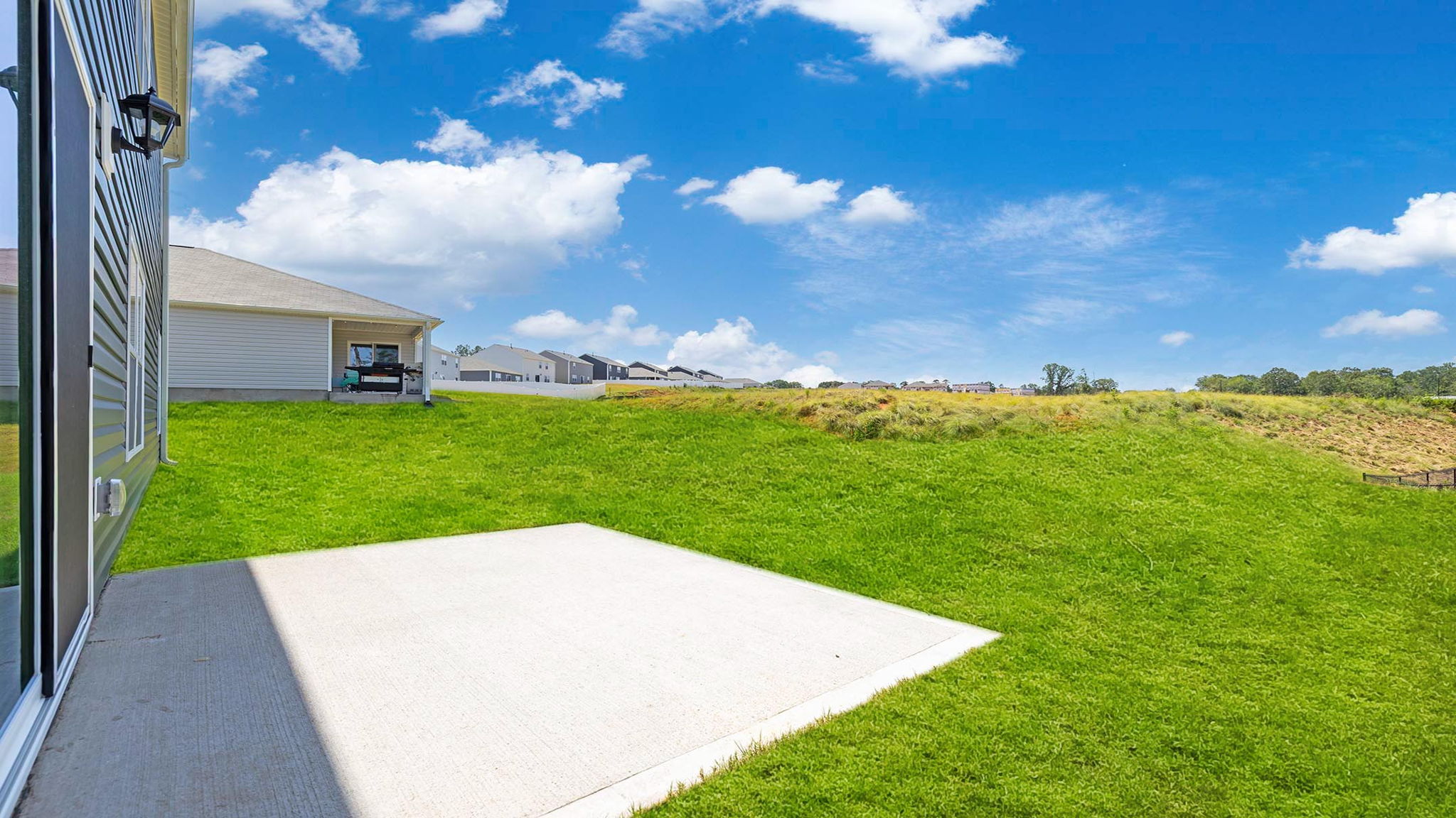 Large backyard of home.