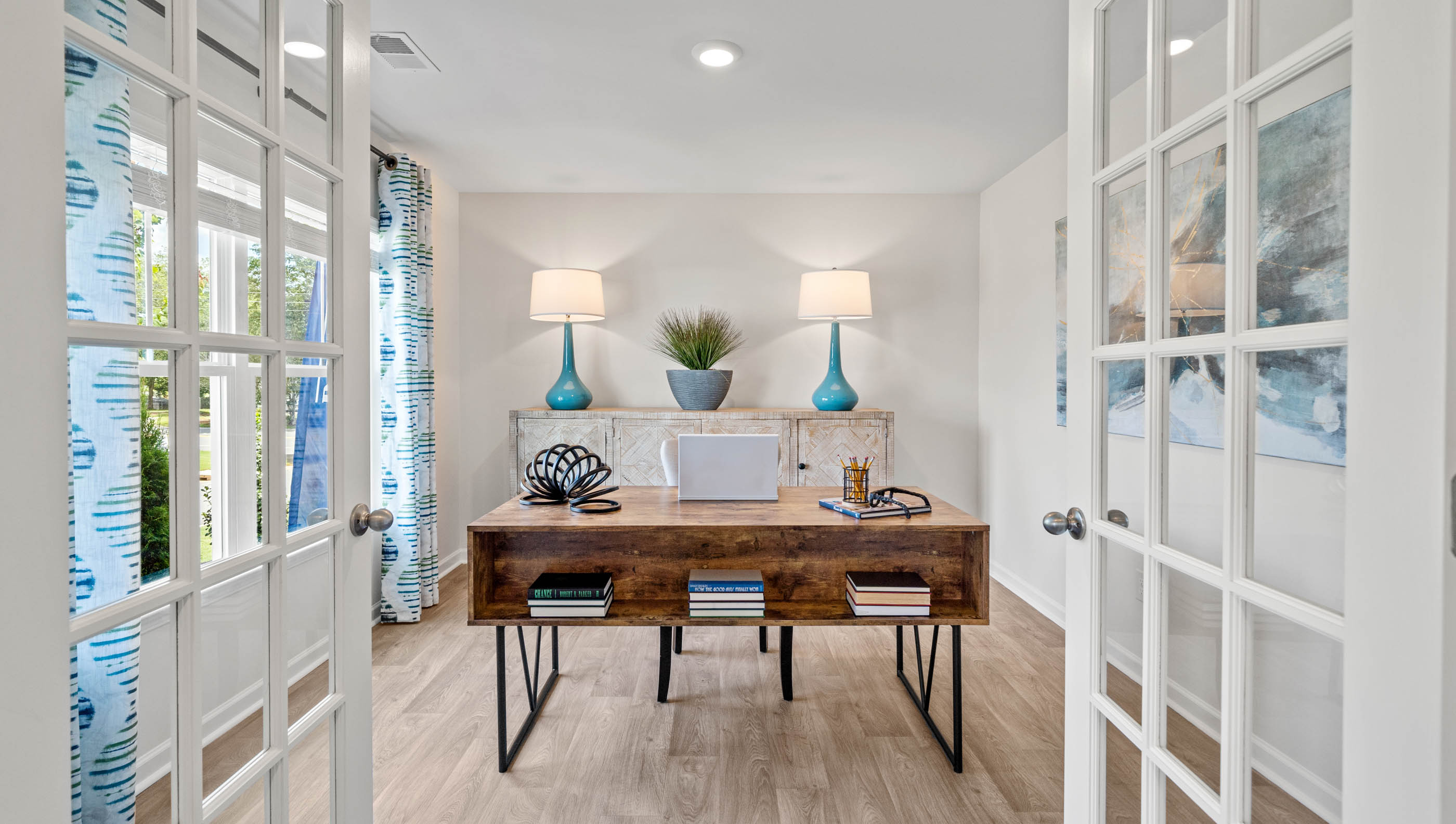 Flex room used ad office with frech doors.