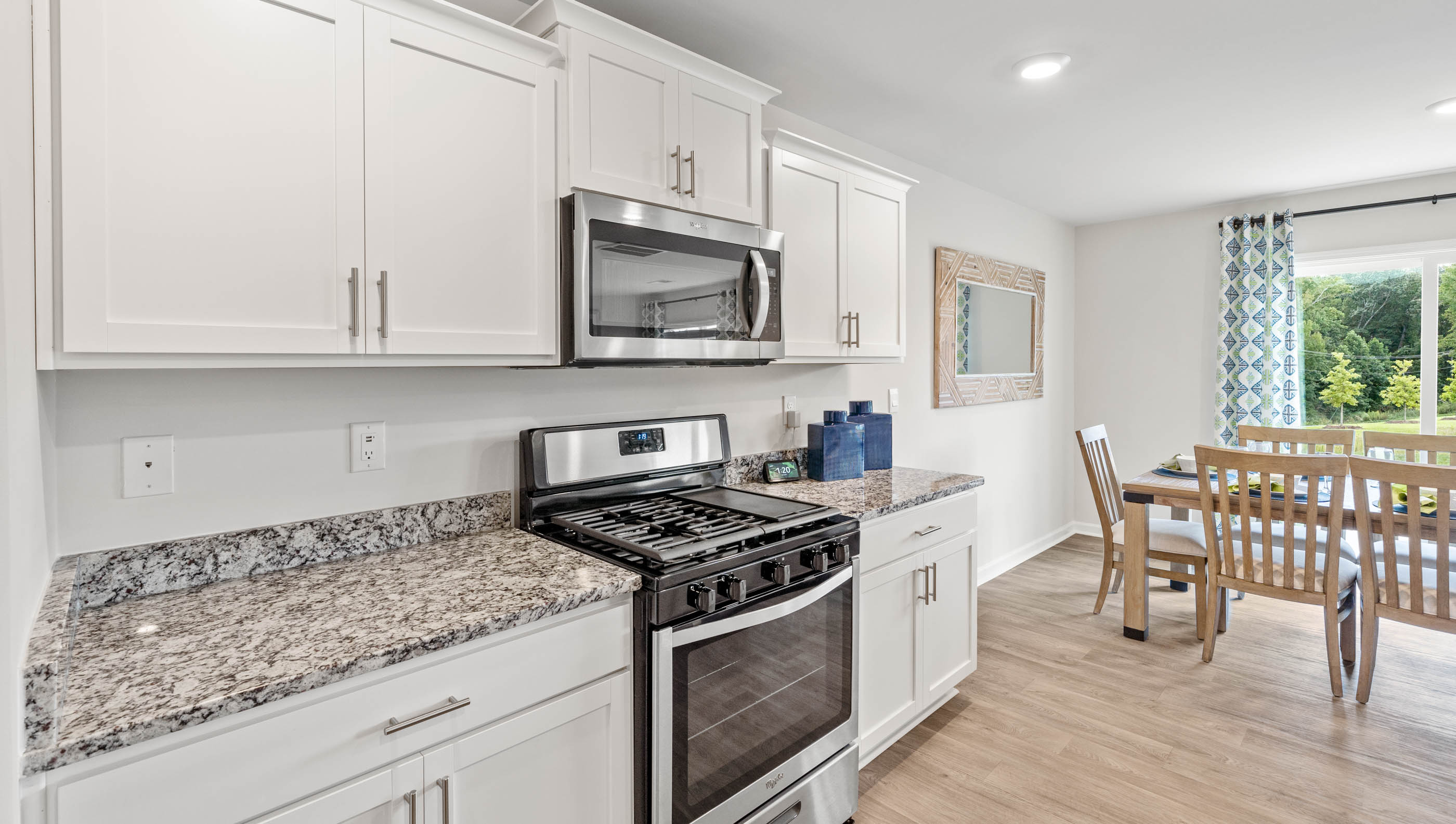 Kitchen with granite counter tops.