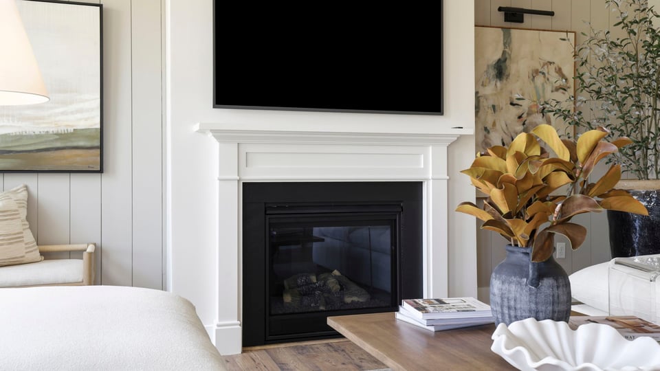 Family room with windows and fireplace.