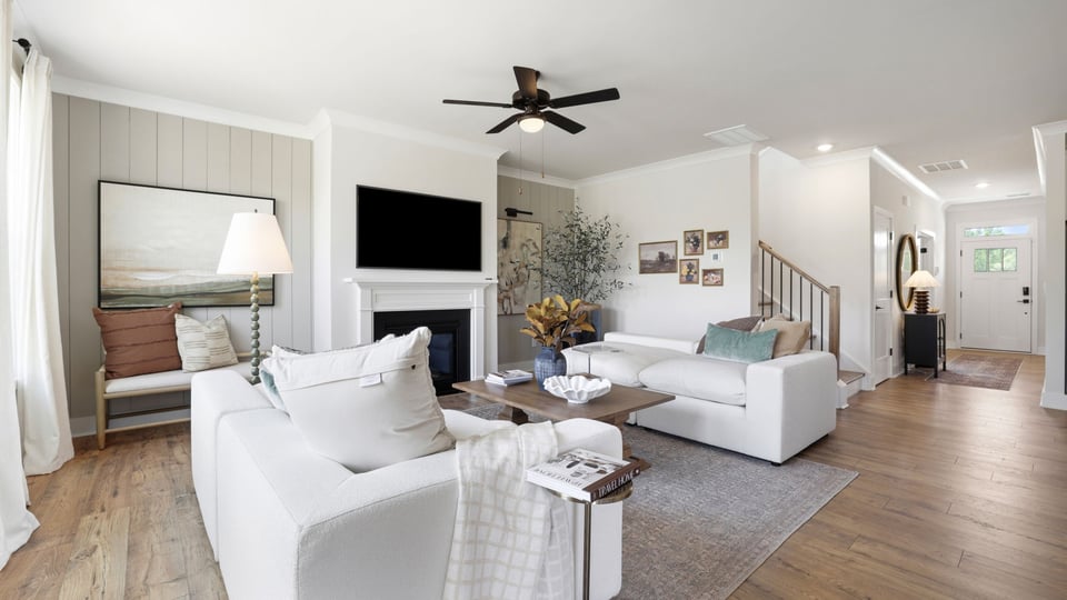 Family room with windows and fireplace.