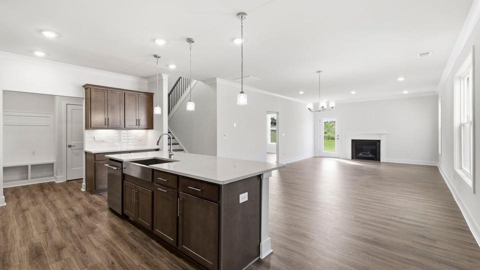 Kitchen with island and cabinets.