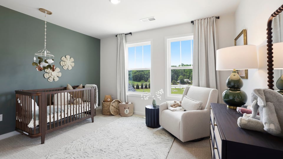 Bedroom with carpet and window.