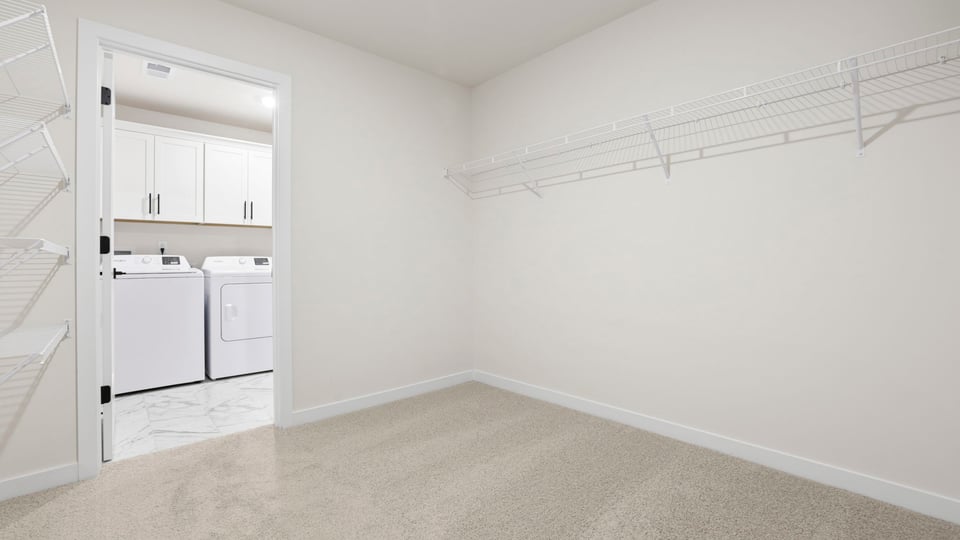 Closet with hanging storage racks.