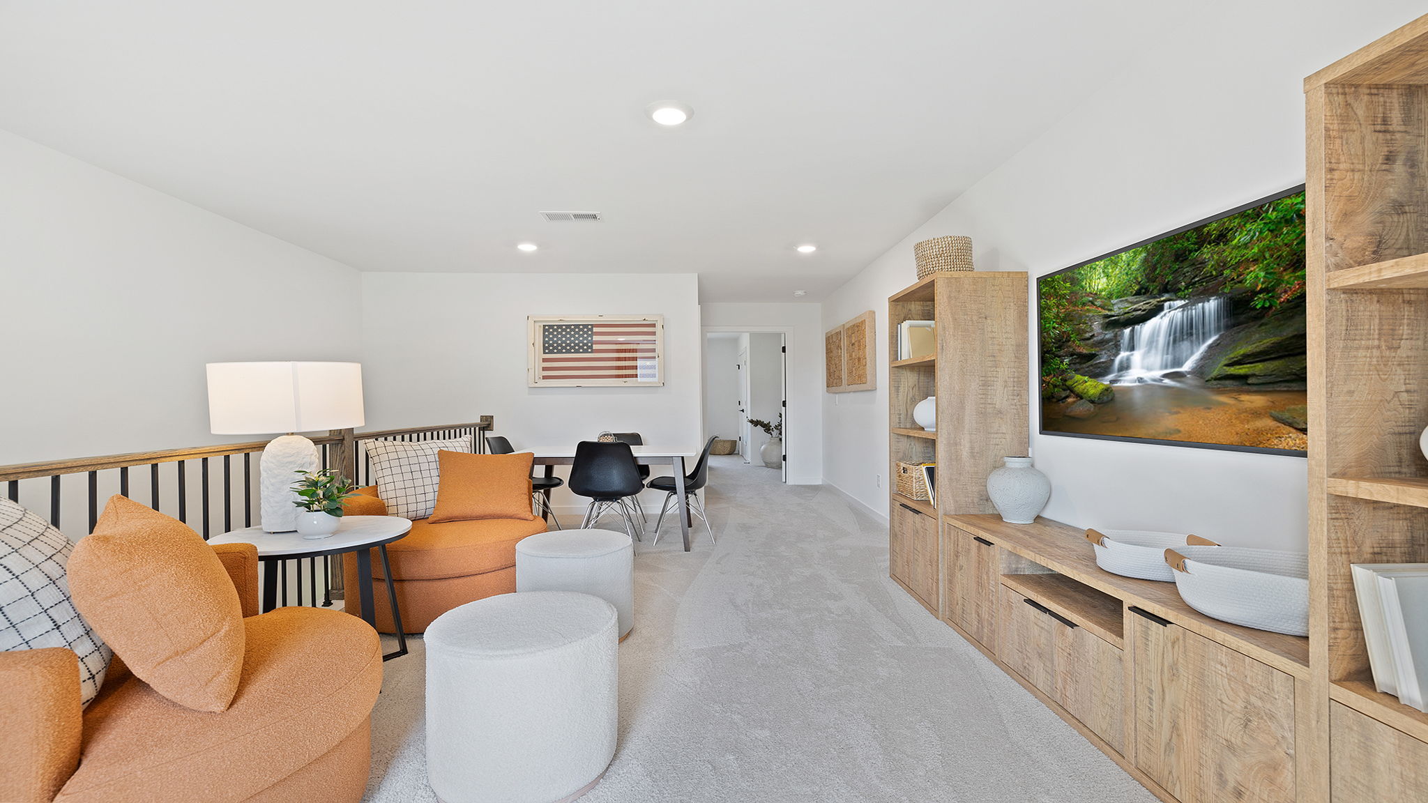 Loft area with carpet.