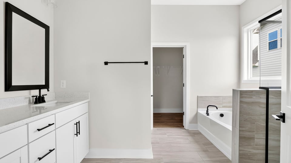 Bathroom with sink and closet.