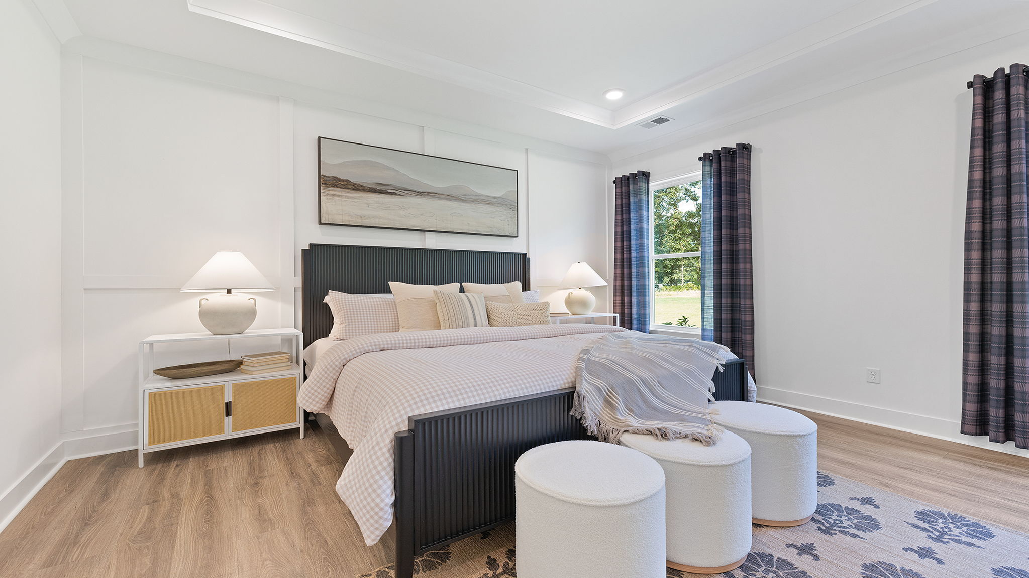 Bedroom with carpet and window.