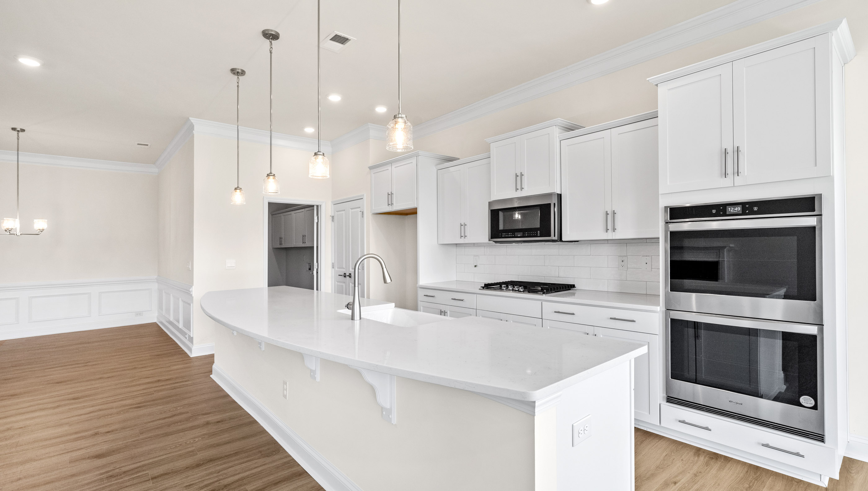 Kitchen with island and countertops.